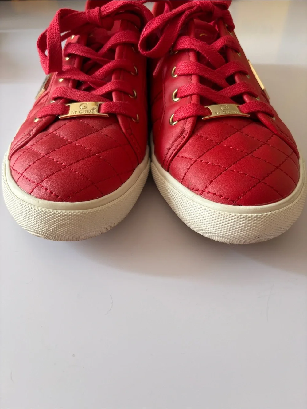 GUESS size 7.5 red quilted leather Sneakers with Gold Hardware very good shape